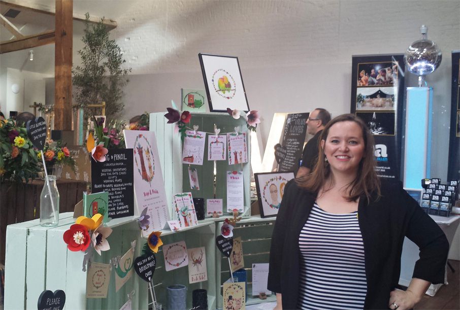 Frog & Pencil illustrator with her stand for the Oxnead Wedding Show